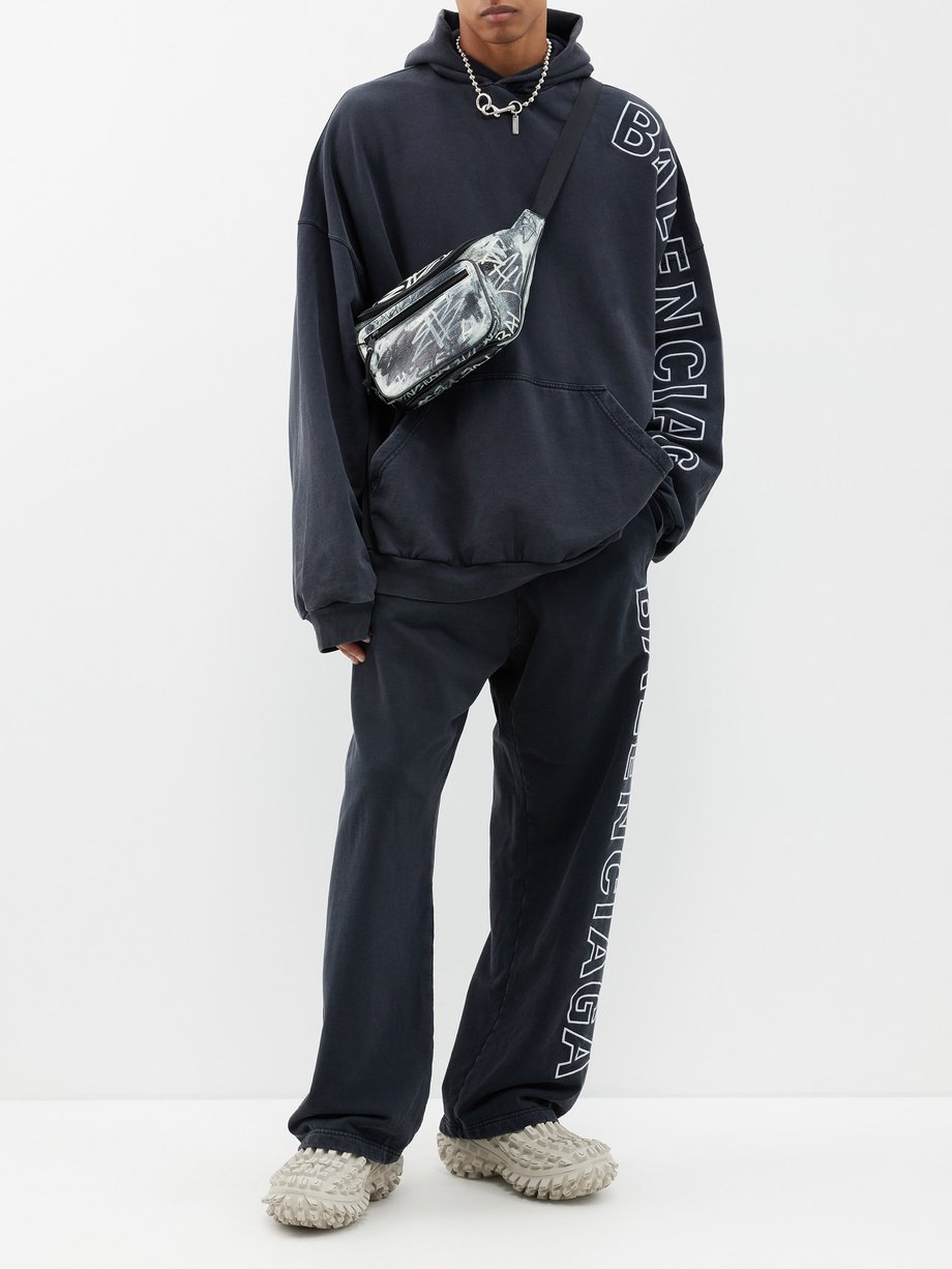 Printed cotton-blend jersey track pants