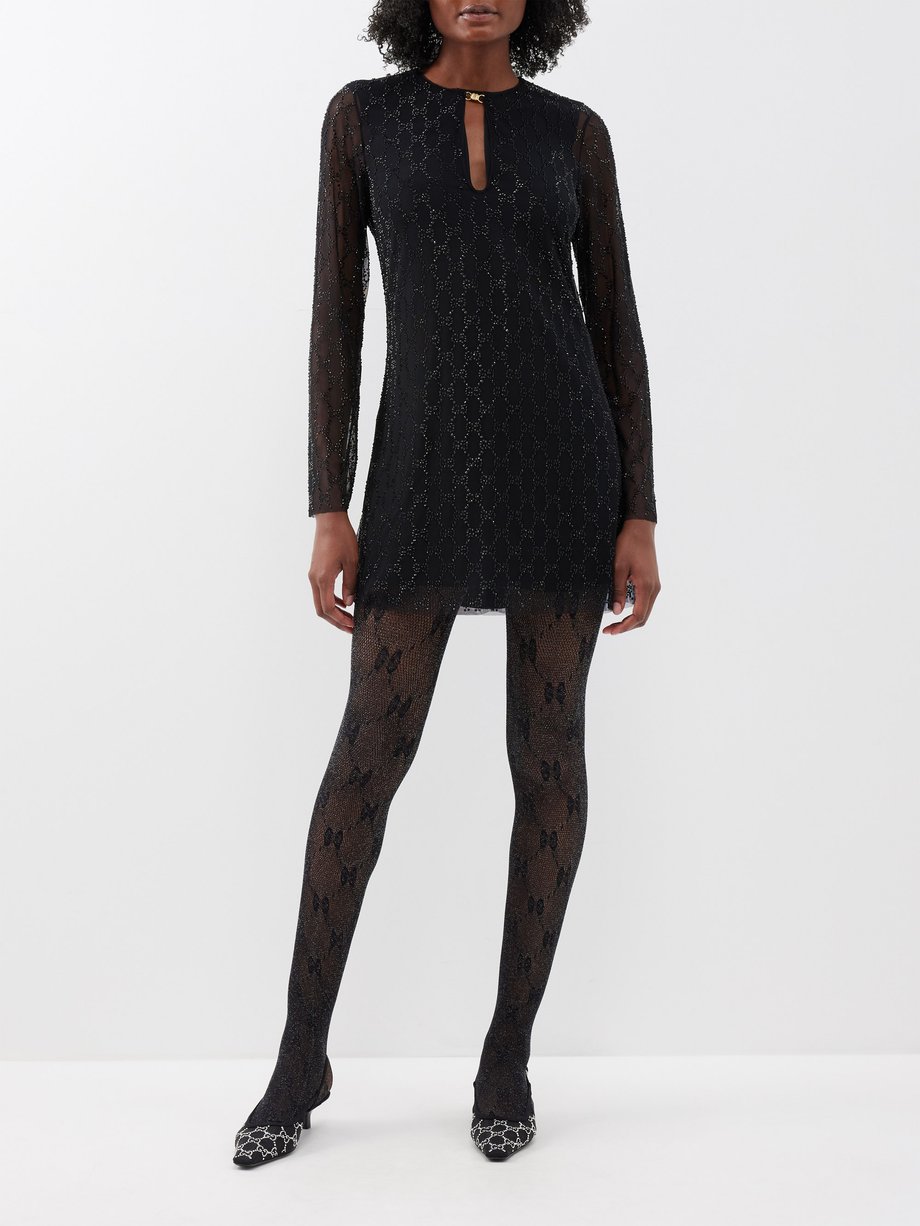 Black Gucci tights in combination with black long sleeve