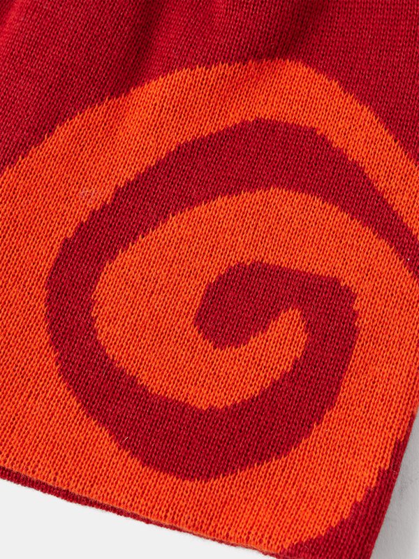 Red Swirl knit beanie | ostrya | MATCHES UK