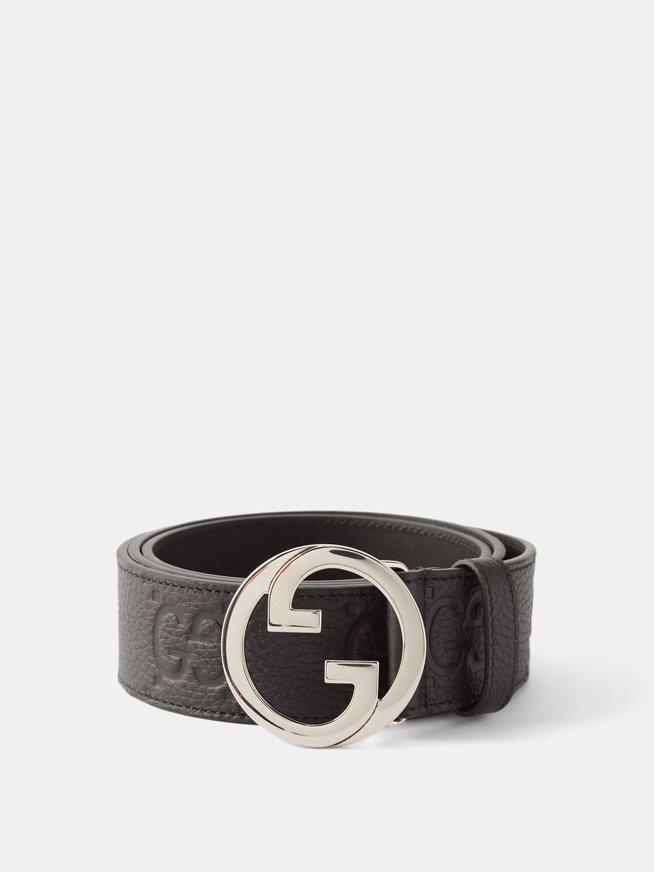Black GG-debossed leather belt | Gucci | MATCHES UK