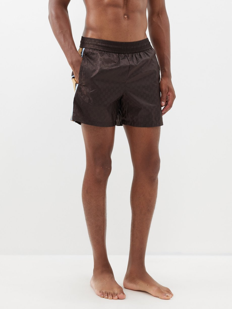 Brown GG-jacquard swim shorts | Gucci | MATCHESFASHION UK