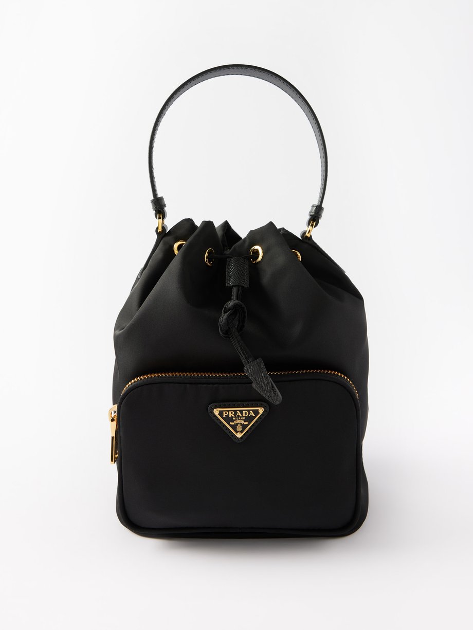Black Re-Nylon leather-trim bucket bag | Prada | MATCHESFASHION UK
