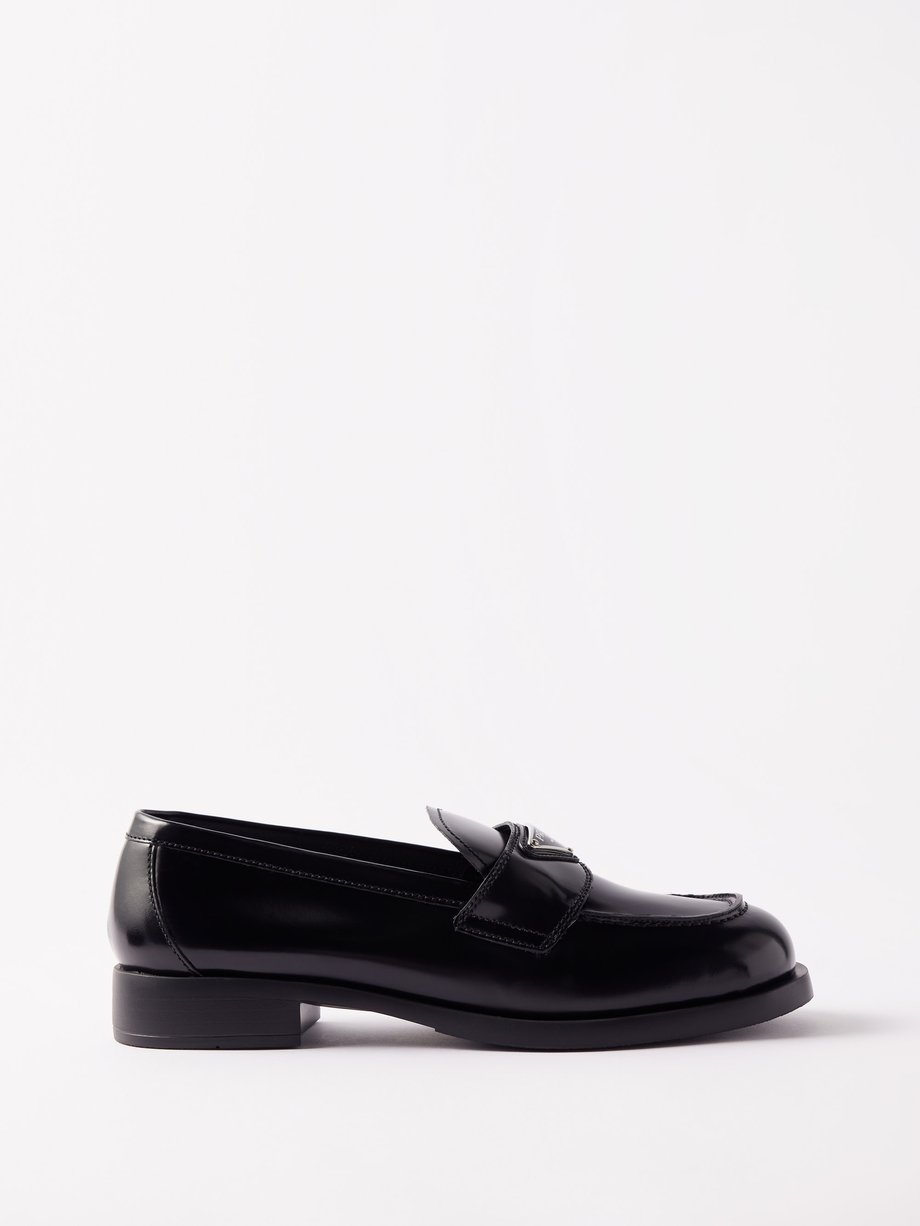 Black Triangle logo-plaque leather loafers | Prada | MATCHES UK