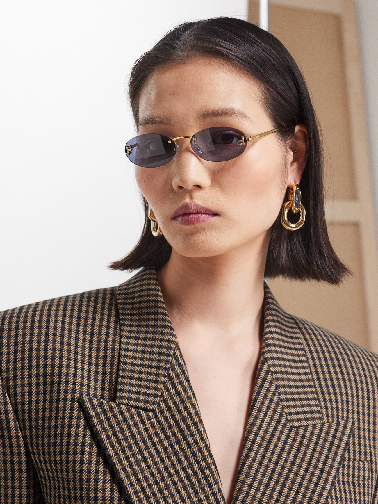 Fendi First Embellished Oval Sunglasses in Black - Fendi