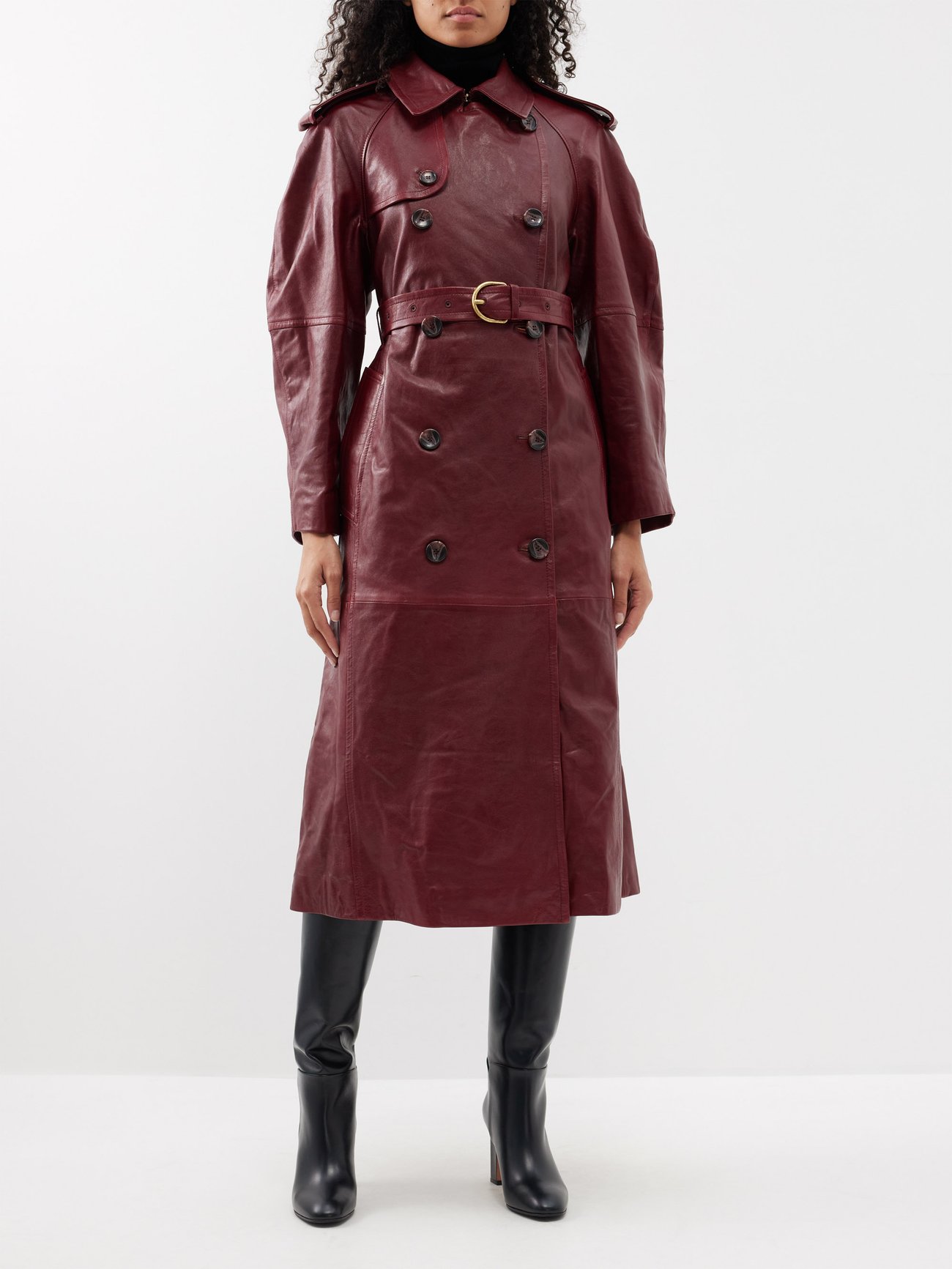 Exude bohemian cool with Ulla Johnson's burgundy Marlowe trench coat, tailored from butter-soft nappa leather with a lightly waxed finish.
