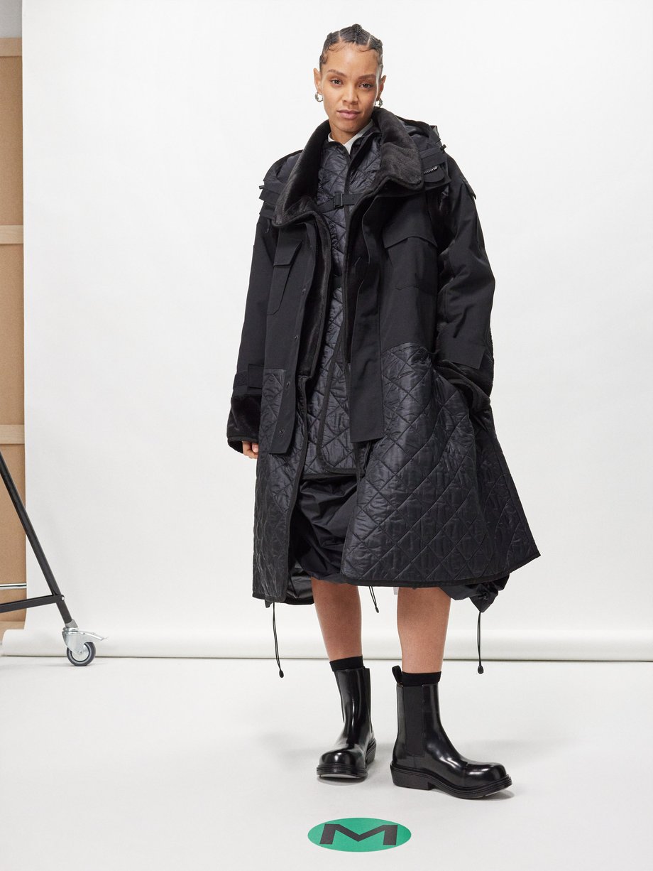 Black Faux-fur trimmed layered ripstop coat | Junya Watanabe | MATCHES UK