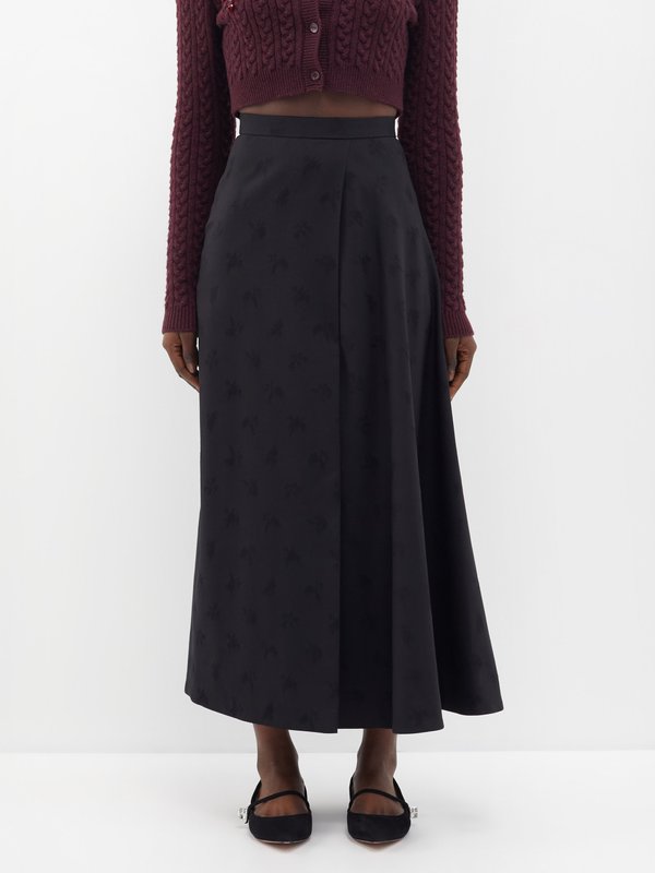 Long dress with side slit skirt and black jacquard silk fabric