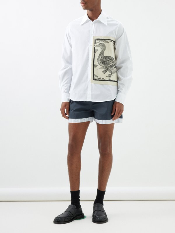 S.S. Daley Thomas pleated cotton-canvas shorts