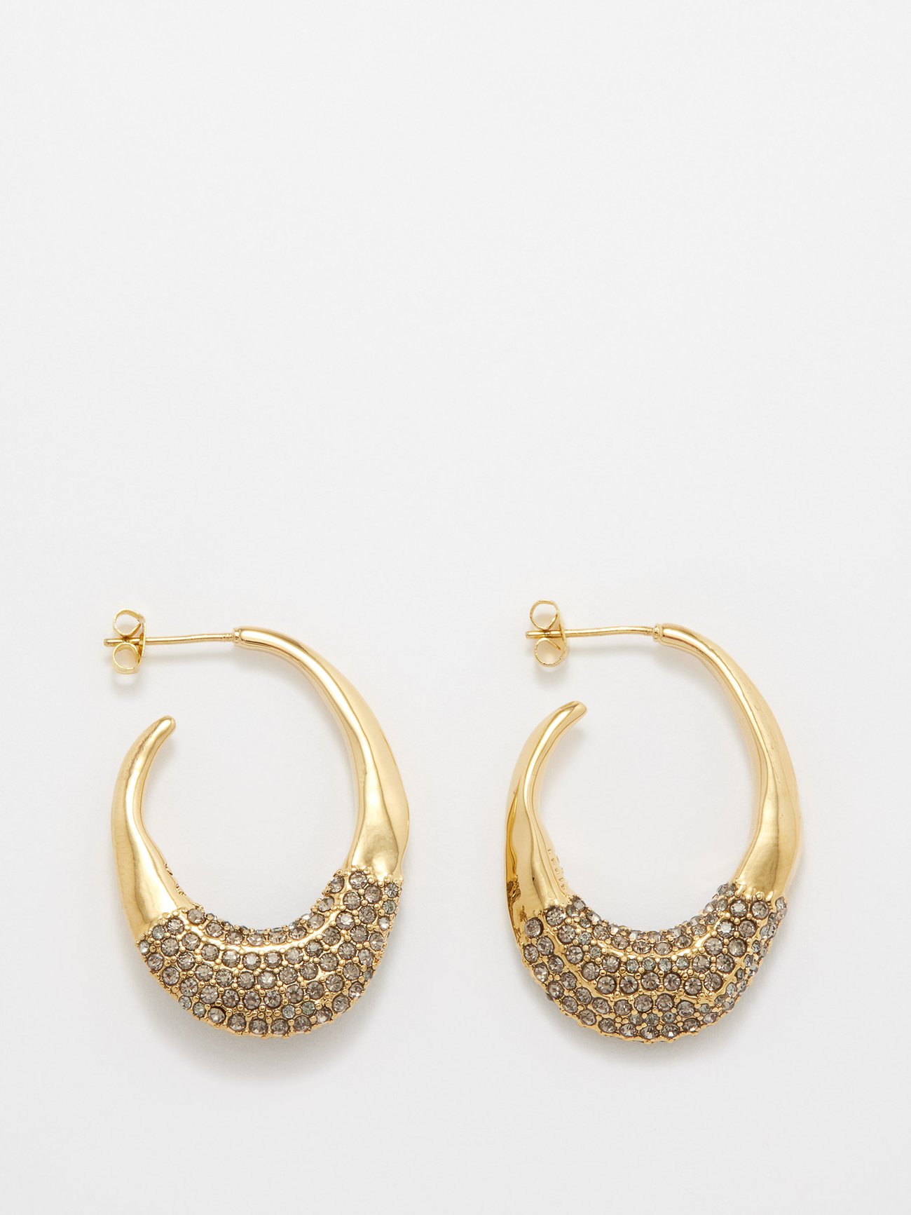 Named after the Aeolian Island off the coast of Italy, By Alona's Panarea earrings are cast in 18kt gold-plated brass set with a glittering pavé of grey crystals.