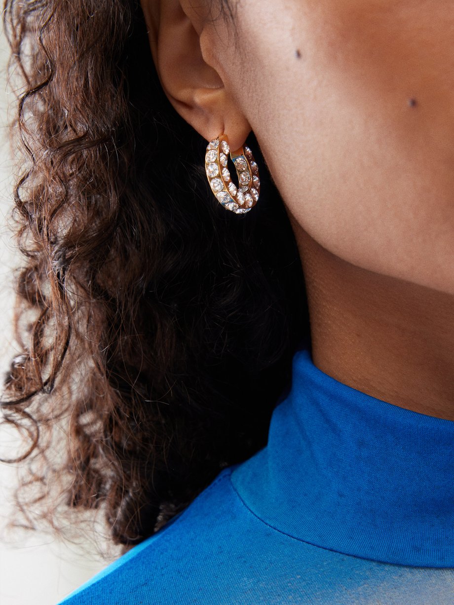 Gold Jah crystal-embellished hoop earrings | Amina Muaddi | MATCHES UK