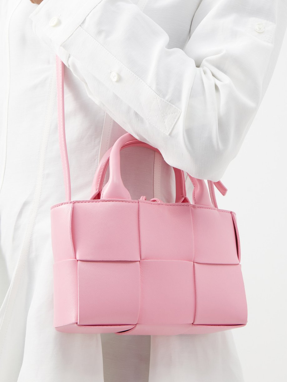 BOTTEGA VENETA: The mini pouch clutch in woven leather - Pink