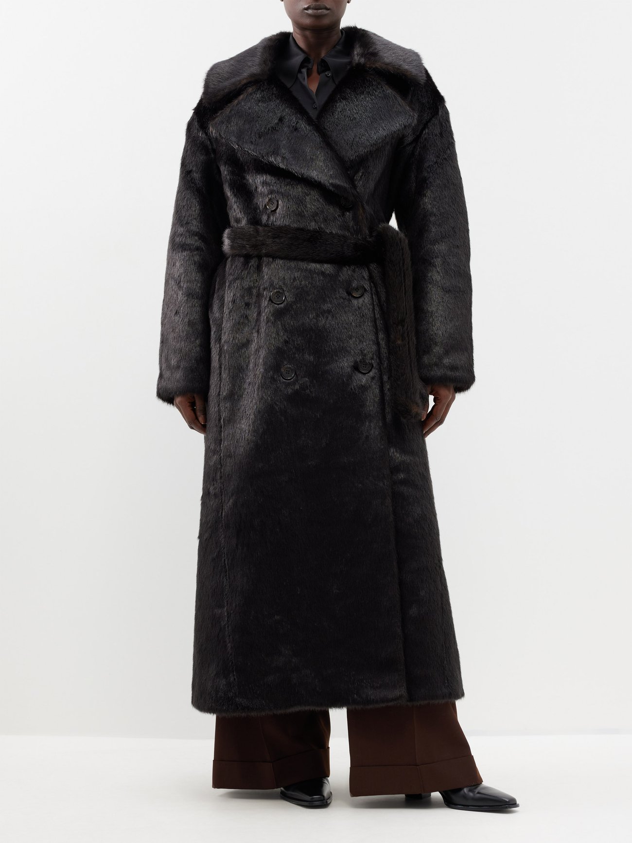 8 types of coats that never go out of style. Opt for a statement look in The Frankie Shop's dark brown Joni coat, made from glossy faux fur with a double-breasted front and optional belt.