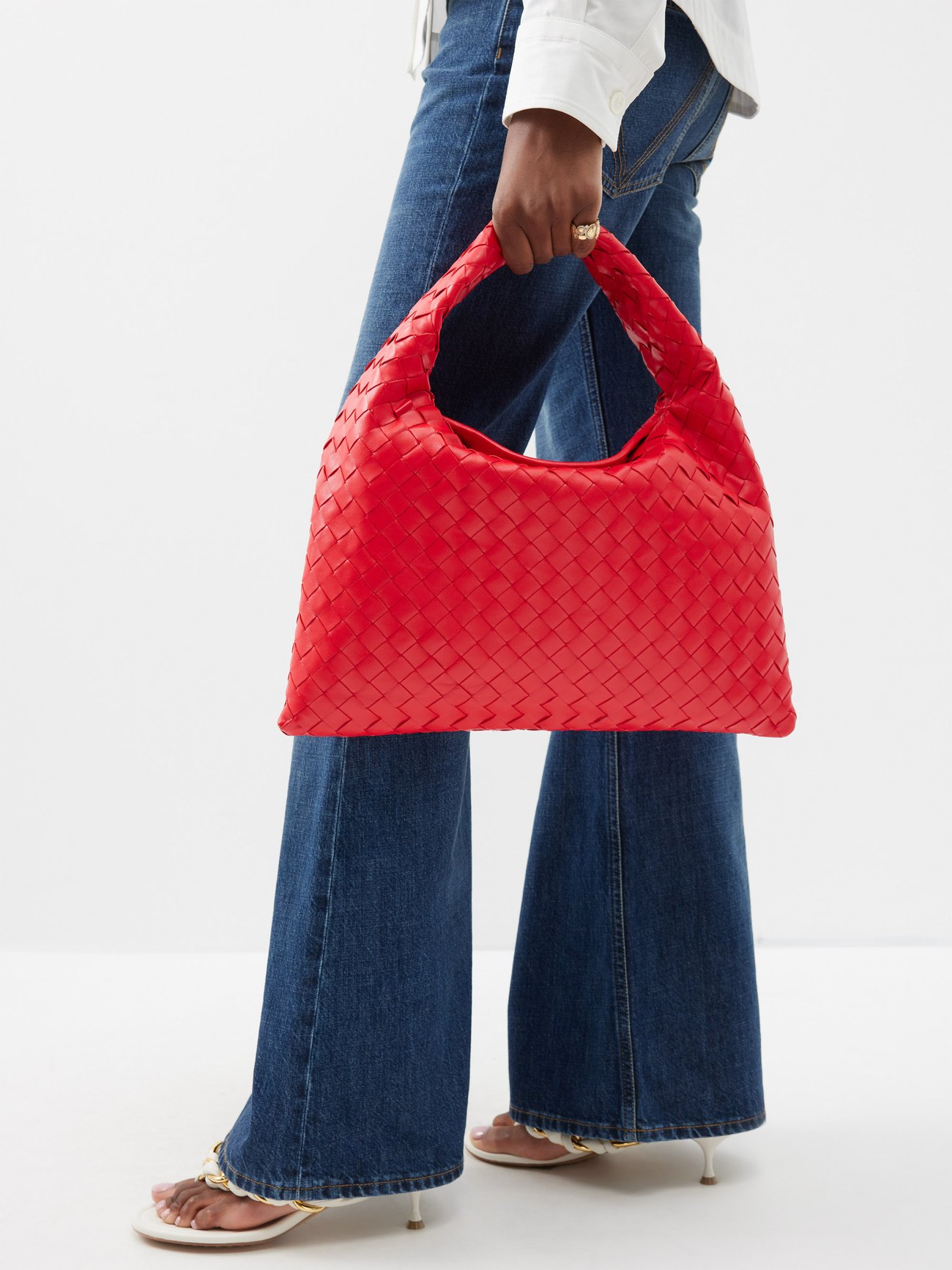 BOTTEGA VENETA: The mini pouch clutch in woven leather - Red