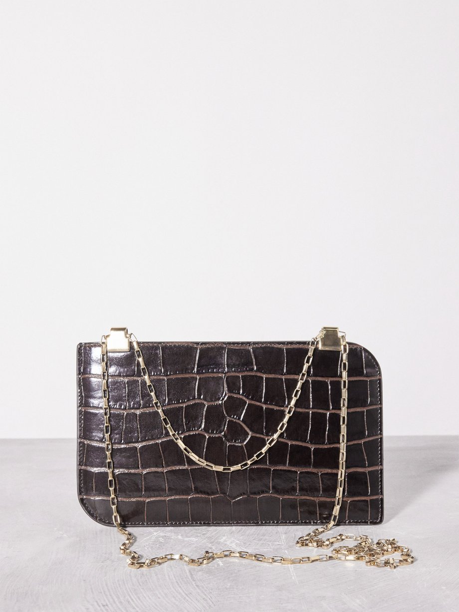 Brown Crocodile-effect leather clutch bag | Toteme | MATCHES UK