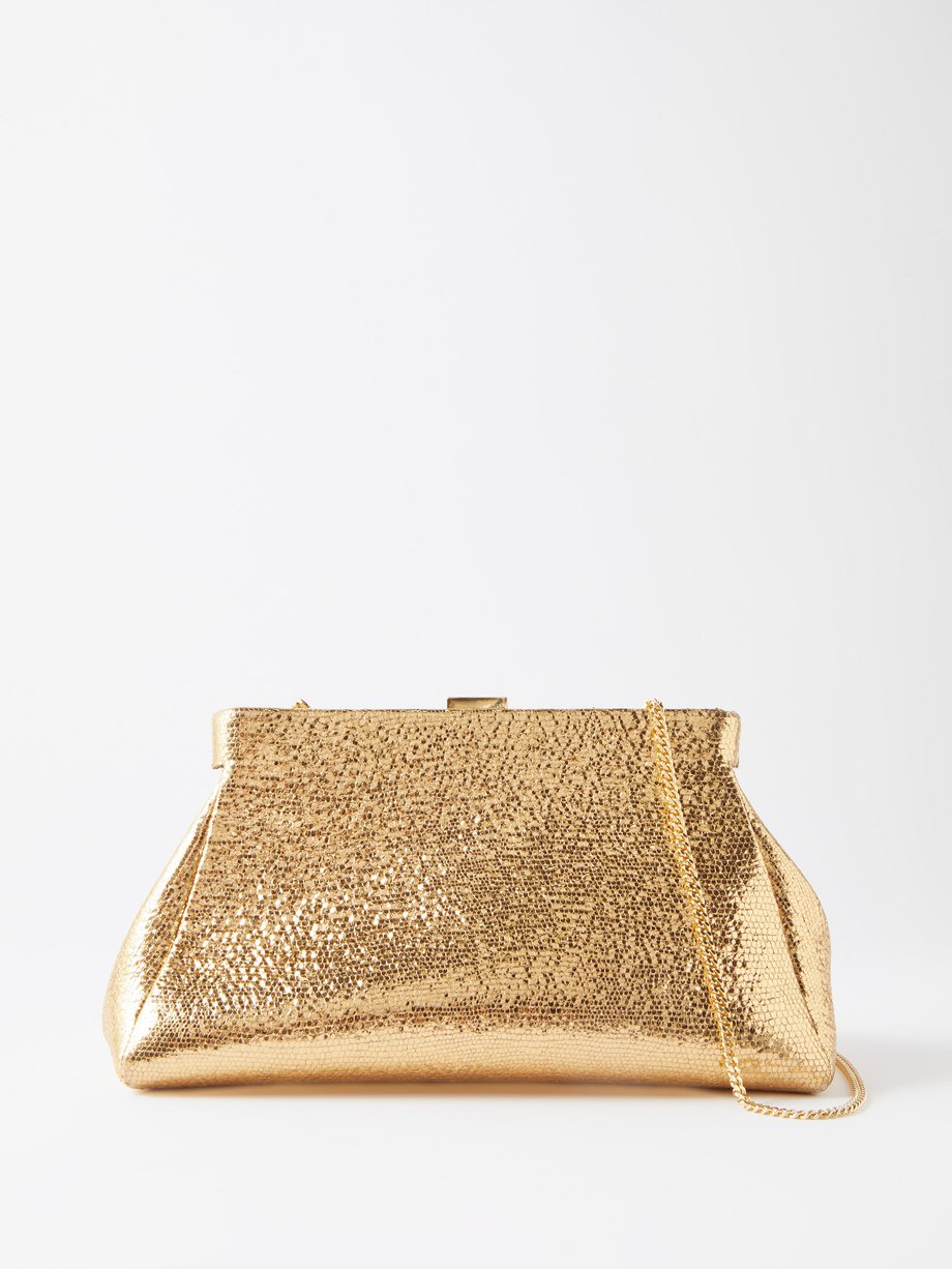 Premium Photo | Small minaudiere purse, beige golden glitter color, fashion  wall