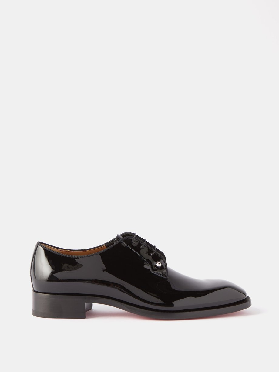 Black Chambeliss pierced patent-leather Derby shoes | Christian ...