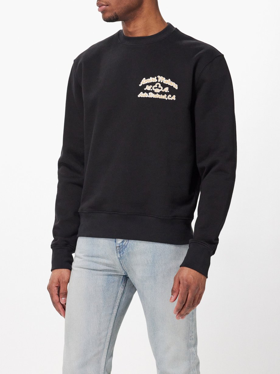 Black Amiri Motors logo-embroidered cotton sweatshirt | Amiri | MATCHES UK
