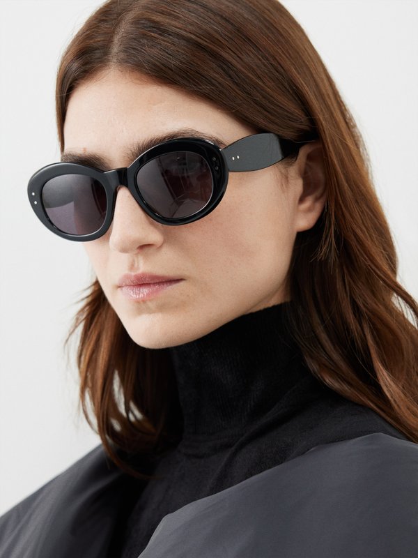 ALAÏA Oval acetate sunglasses