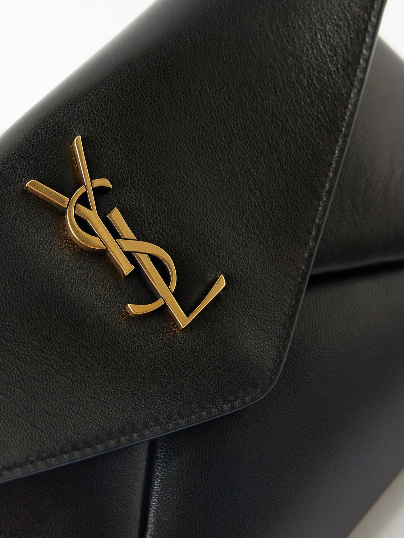 Black Cassandre small leather clutch bag, Saint Laurent