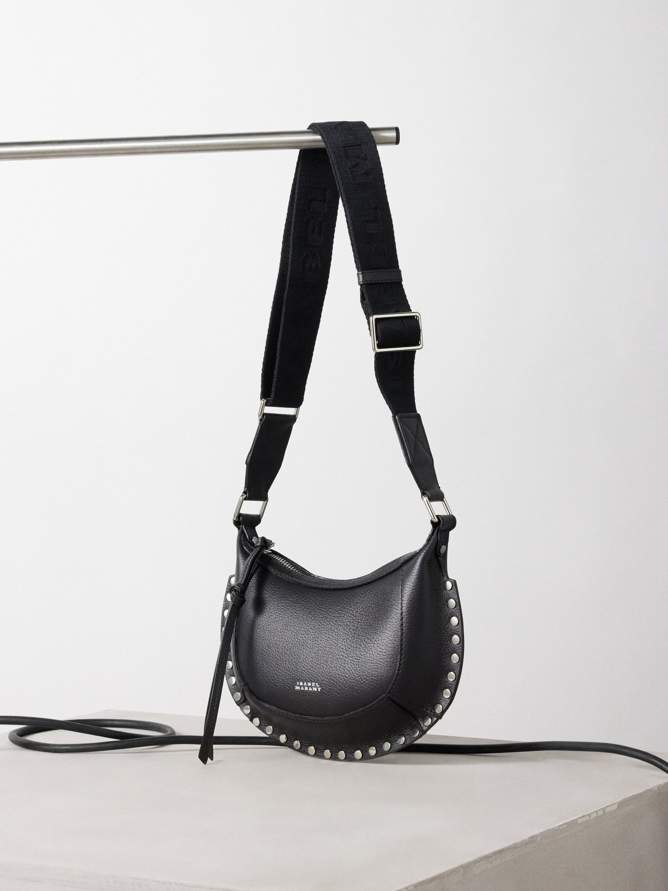 Black Oskan Moon mini grained-leather cross-body bag | Isabel