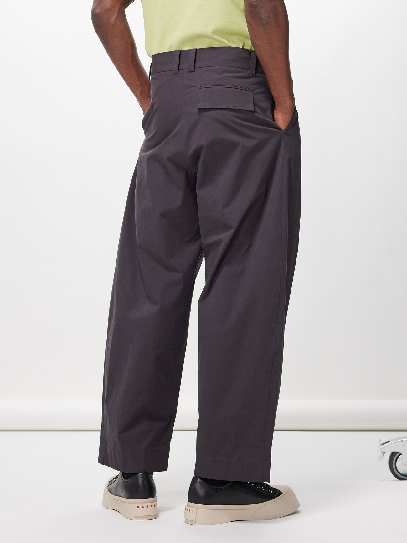 Grey Yale double-pleat cotton trousers | Studio Nicholson | MATCHES UK