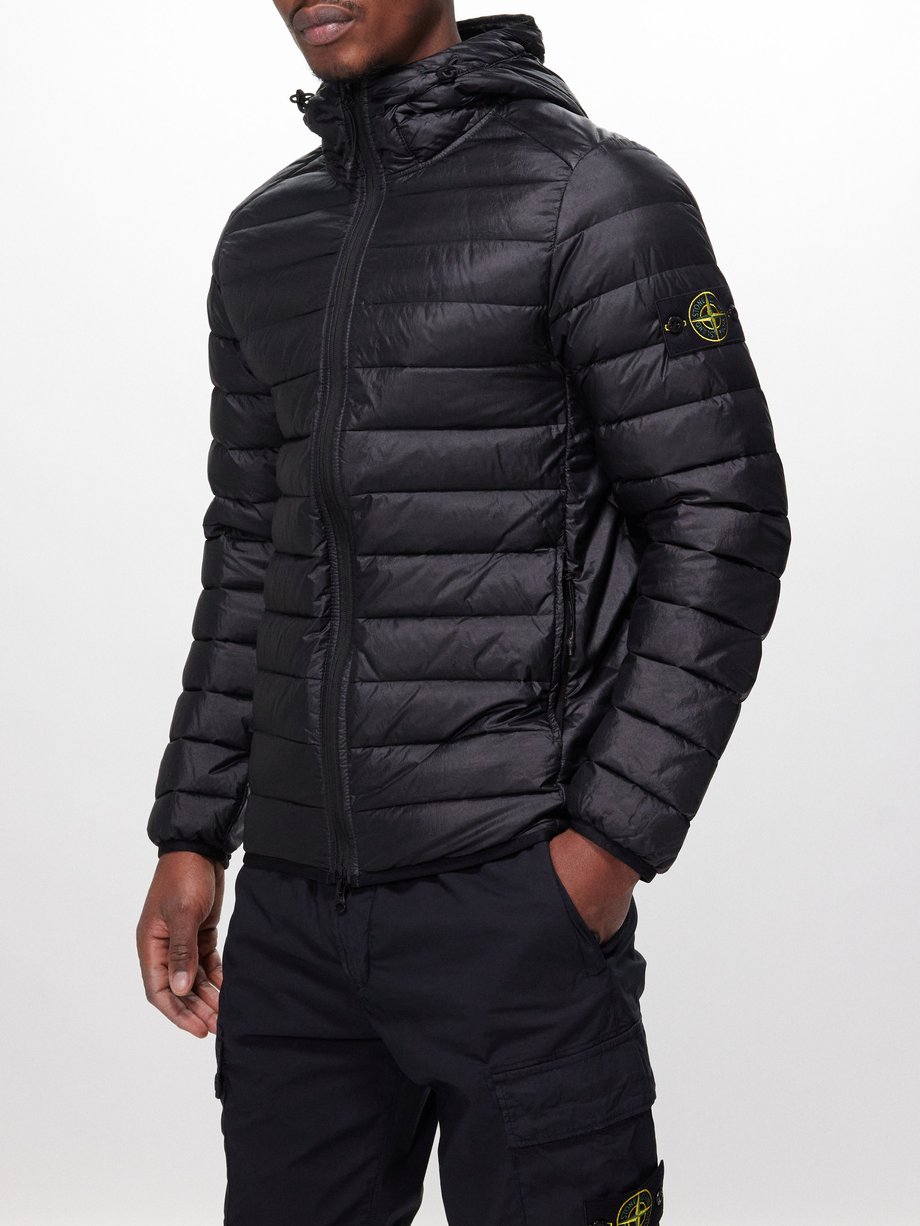 Black Hooded quilted down jacket | Stone Island | MATCHES UK