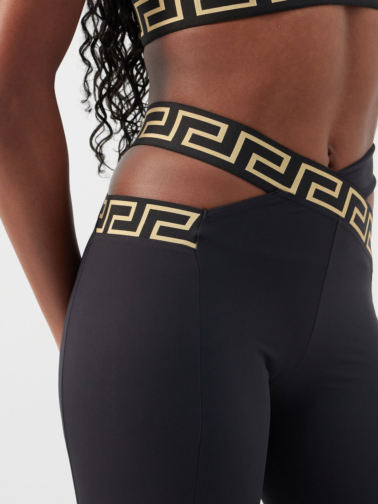 Black Greca-jacquard cutout technical leggings, Versace