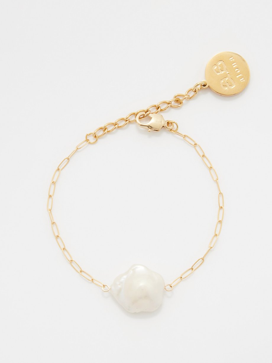 Gold Daisy pearl and 18kt gold-plated bracelet | By Alona | MATCHES UK