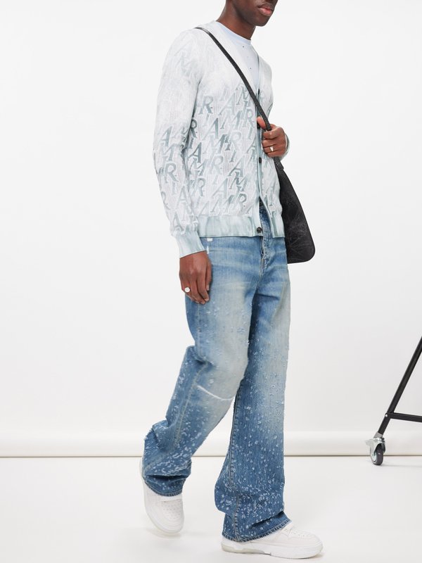 Amiri Shotgun distressed wide-leg jeans