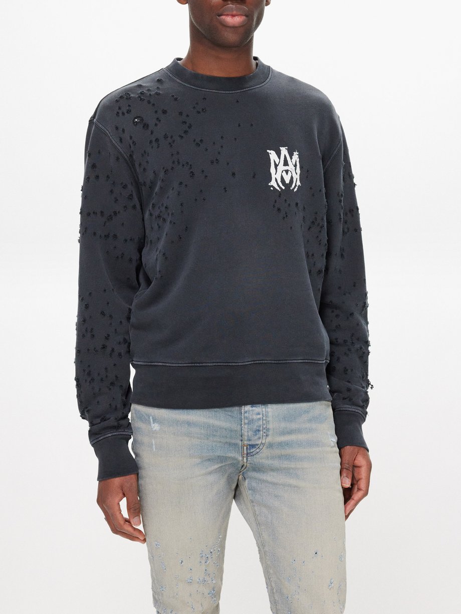 Black Shotgun distressed cotton sweatshirt | Amiri | MATCHES UK