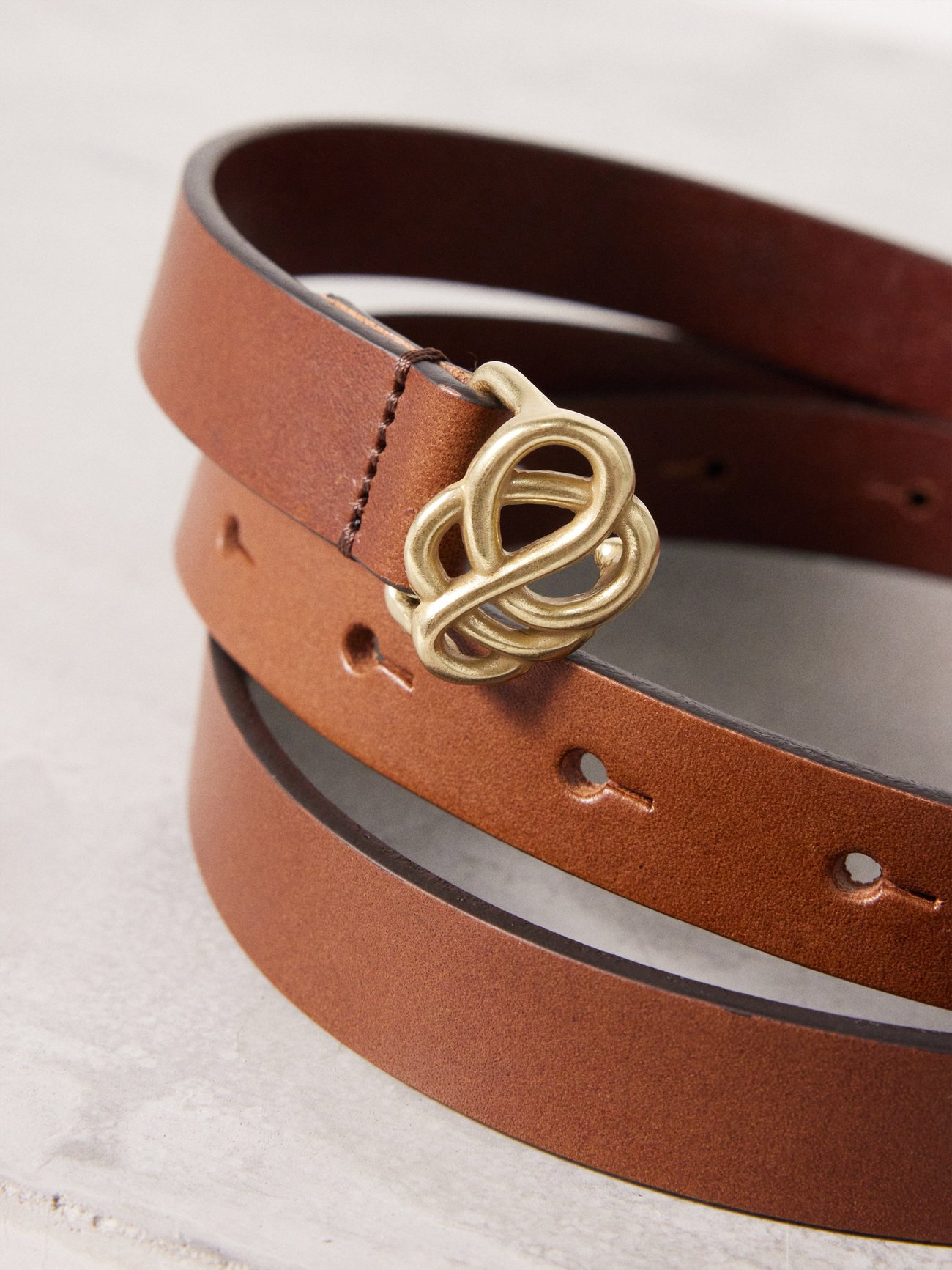 Brown Ouma twisted buckle leather belt By Malene Birger MATCHES UK