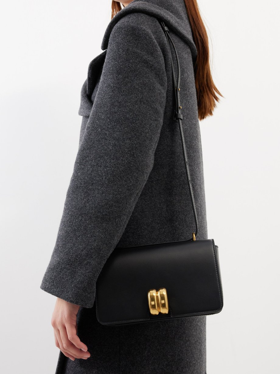 Black Noval leather cross body bag By Malene Birger MATCHES UK