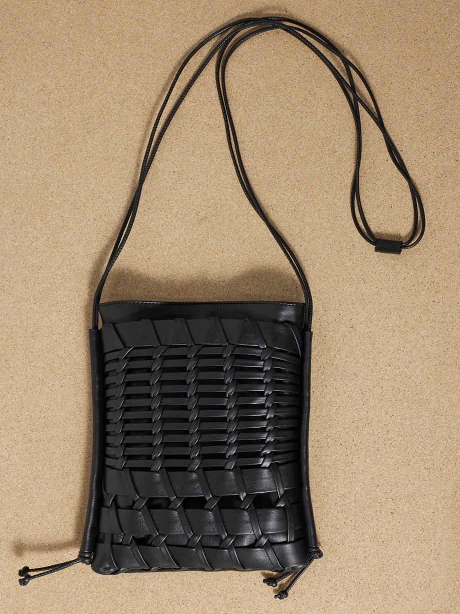 Black Trena woven-leather cross-body bag | Hereu | MATCHES UK