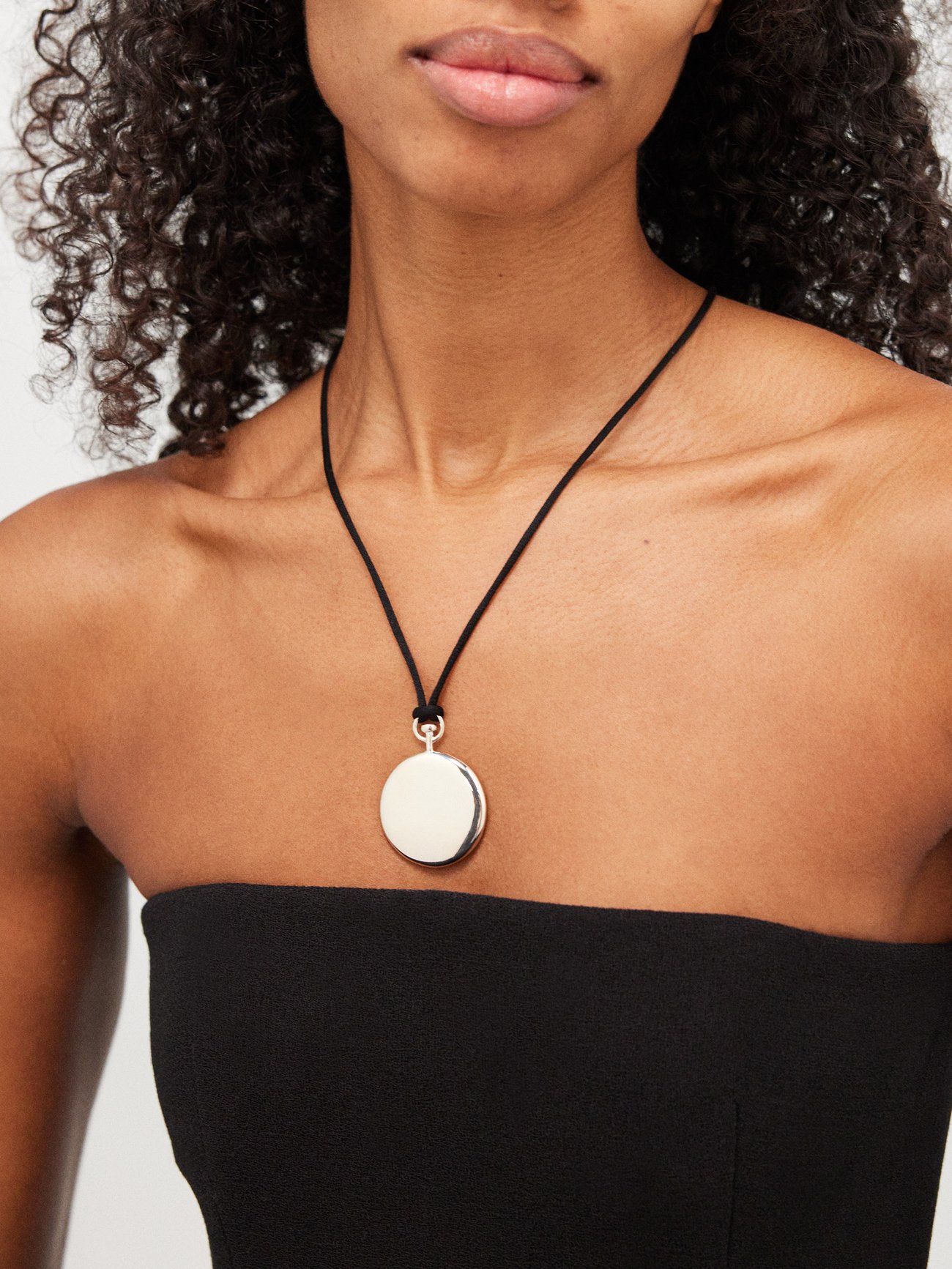 Handcrafted in Los Angeles from sterling silver and satin cord, Sophie Buhai's necklace is centred with a large pendant and features molten-effect teardrop tips.