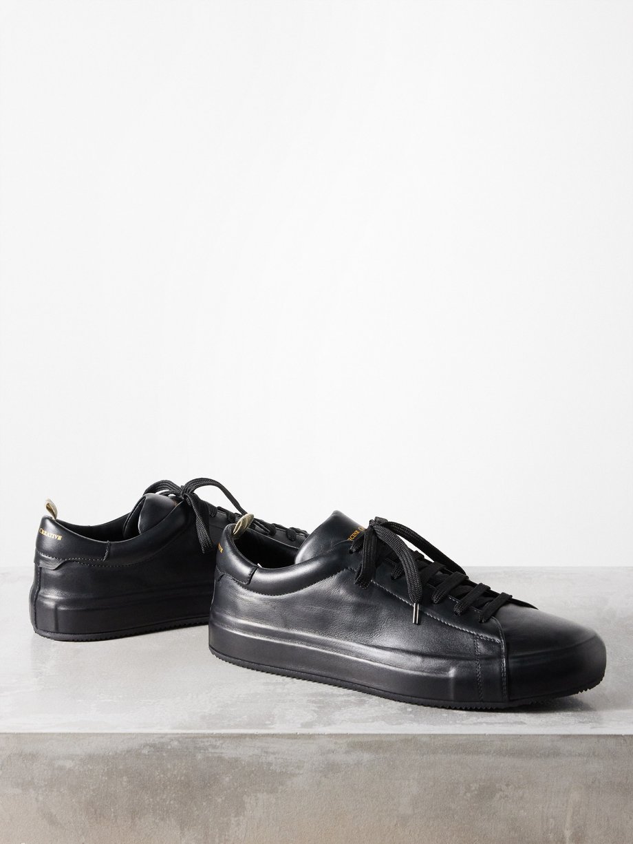 Black Easy 001 leather trainers | Officine Creative | MATCHES UK