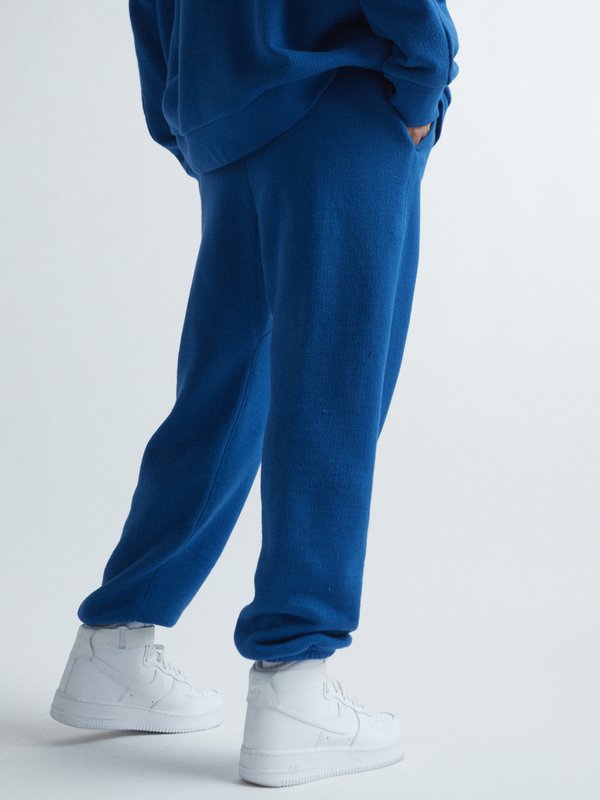 Blue Cropped organic-cotton track pants | Raey | MATCHES UK