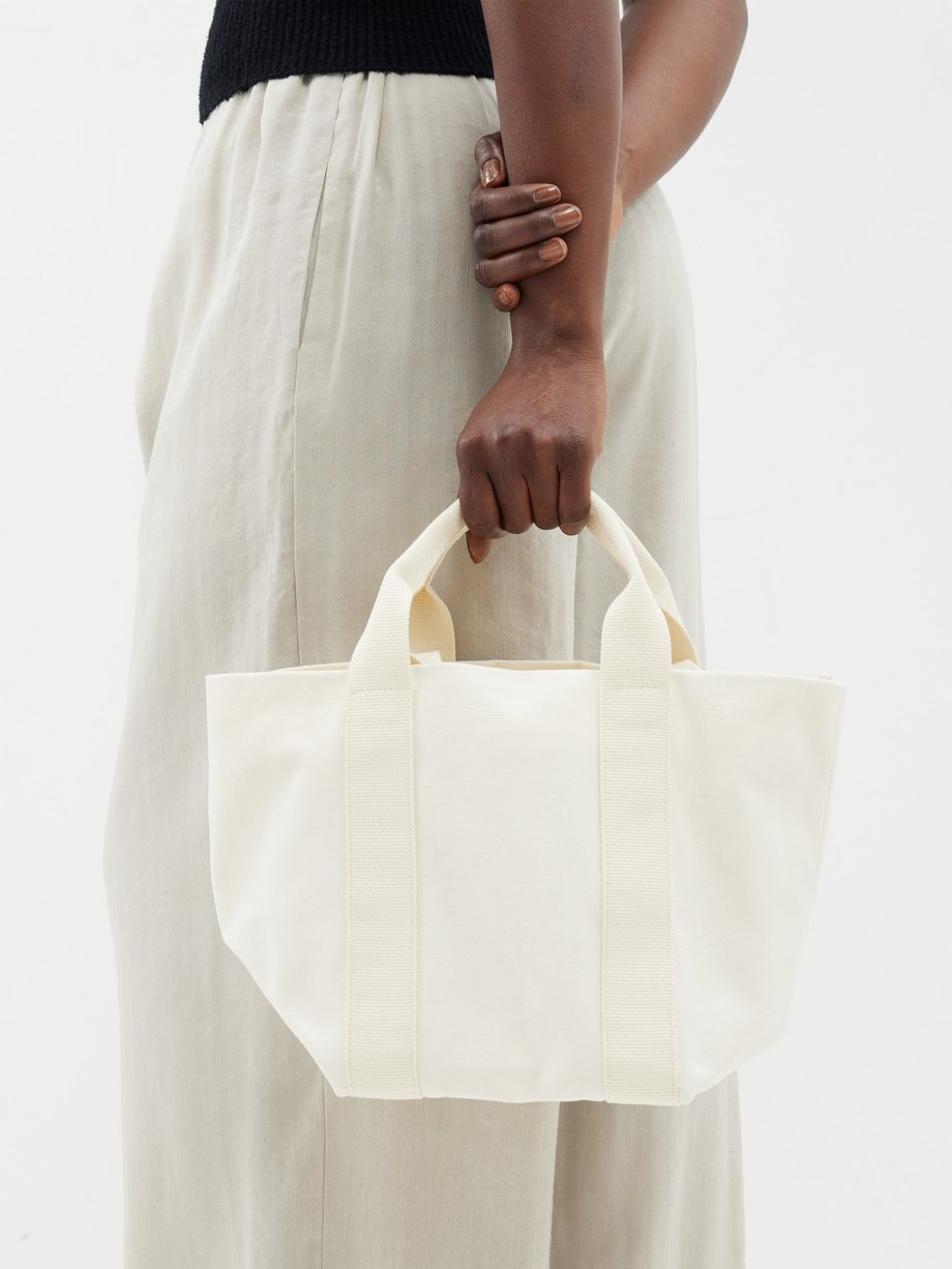 White Sam canvas tote bag | Muuñ | MATCHES UK