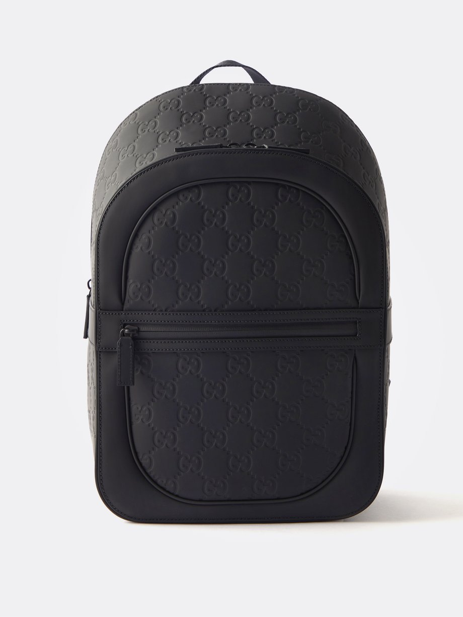 Black Debossed GG logo leather backpack | Gucci | MATCHES UK