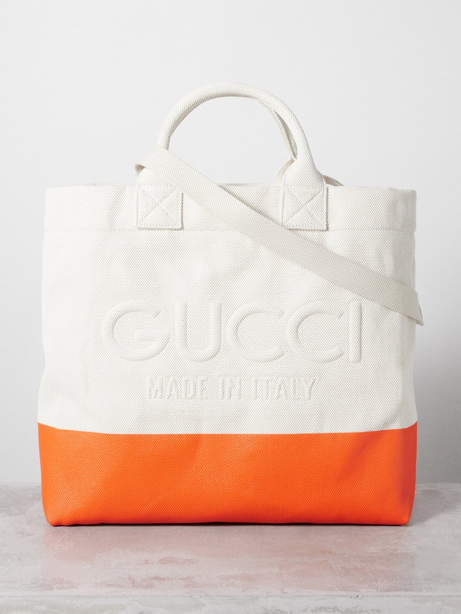 Orange Logo embossed canvas tote bag Gucci MATCHES UK