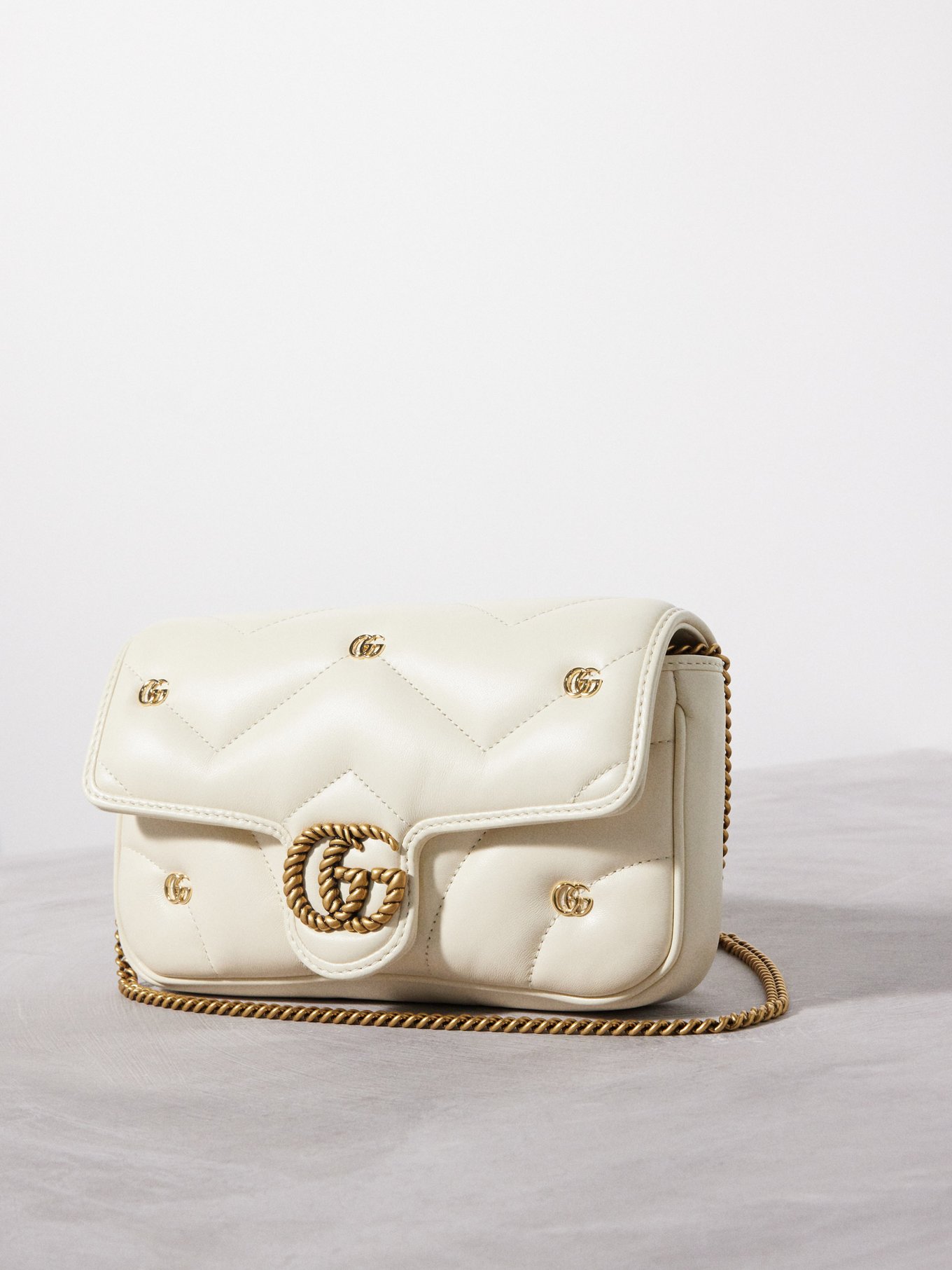 GG Marmont mini matelass leather cross body bag Gucci