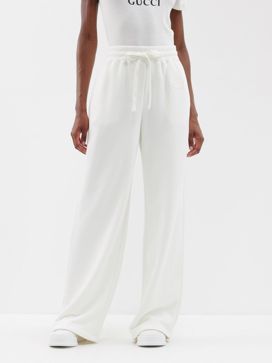 White Interlocking G-embroidered cotton-jersey trousers | Gucci ...