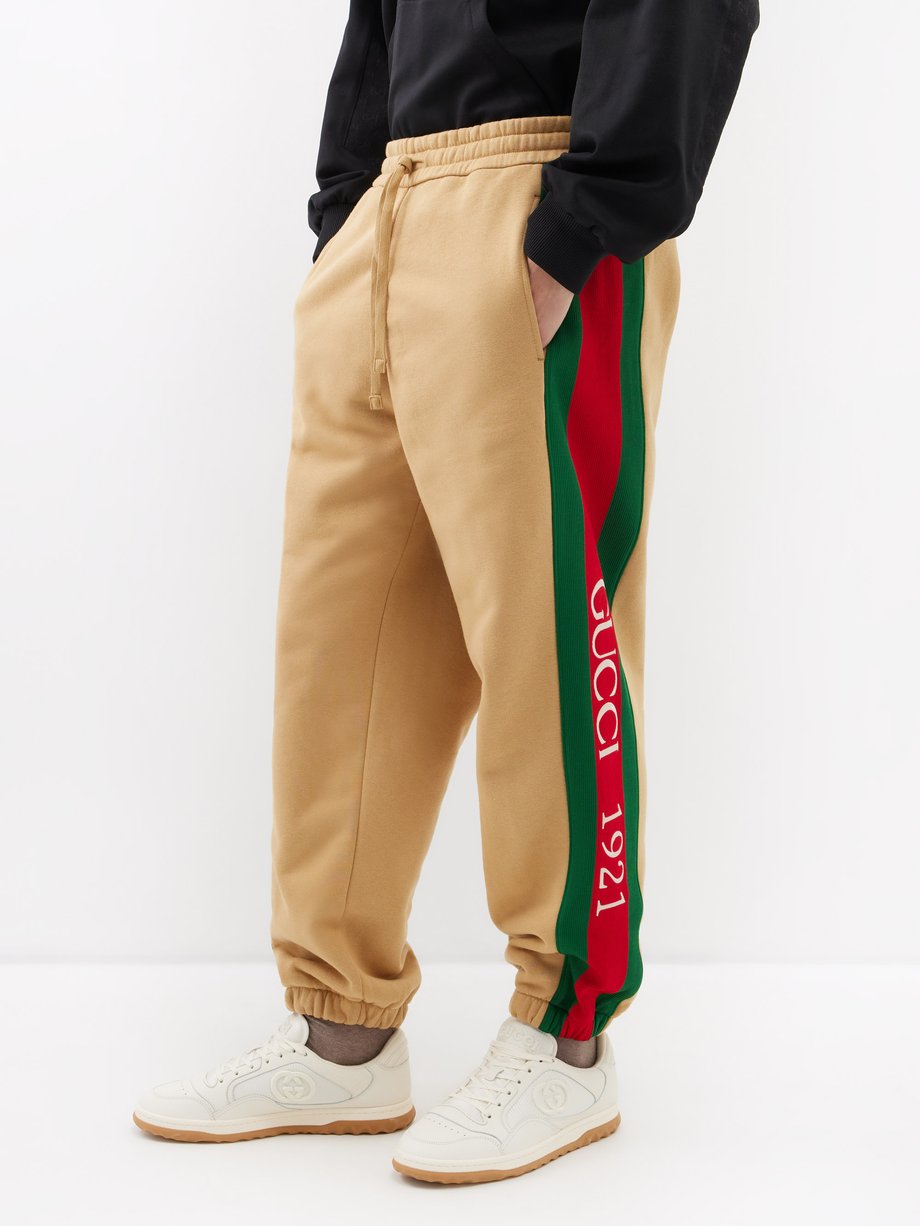 Camel Web stripe cotton-jersey track pants | Gucci | MATCHES UK