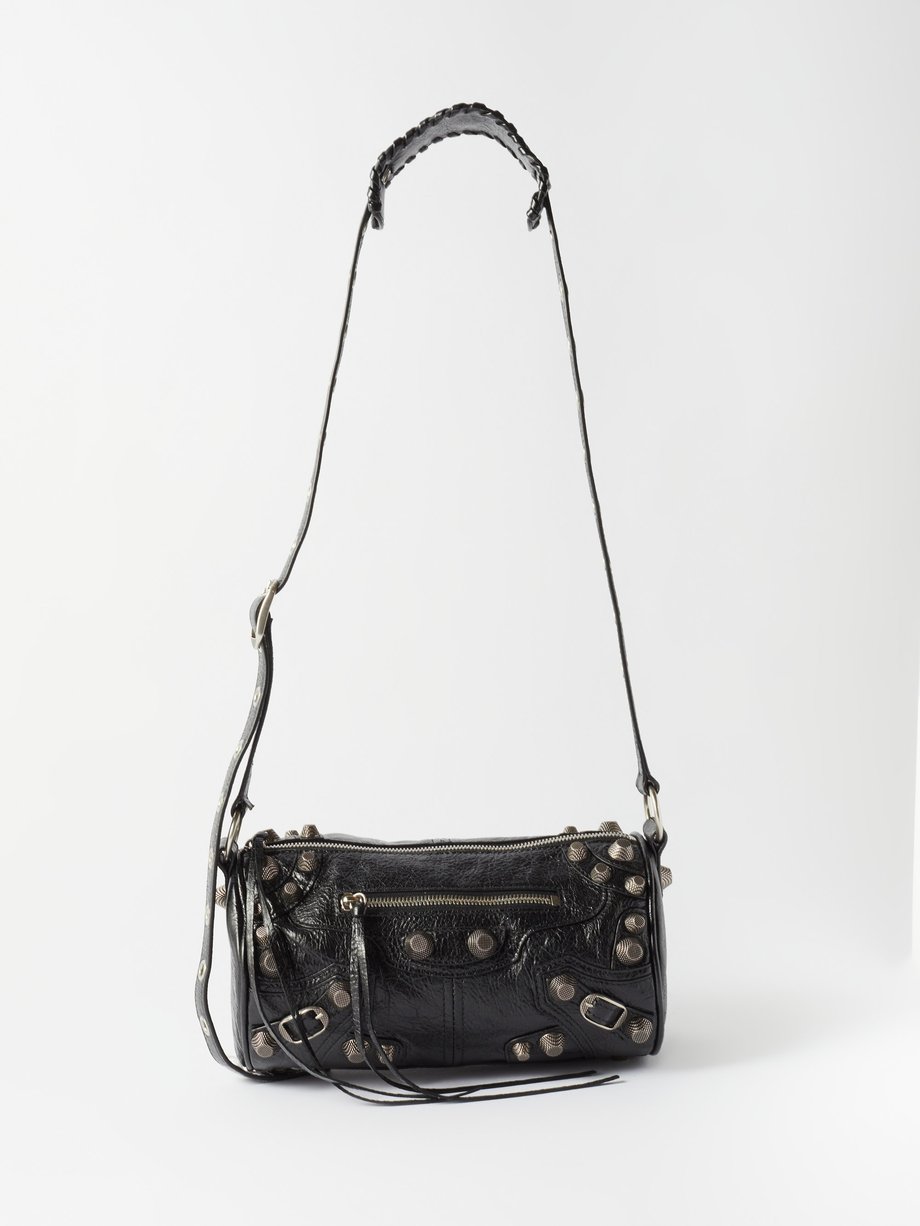 Black Le Cagole cylindrical leather cross-body bag | Balenciaga ...