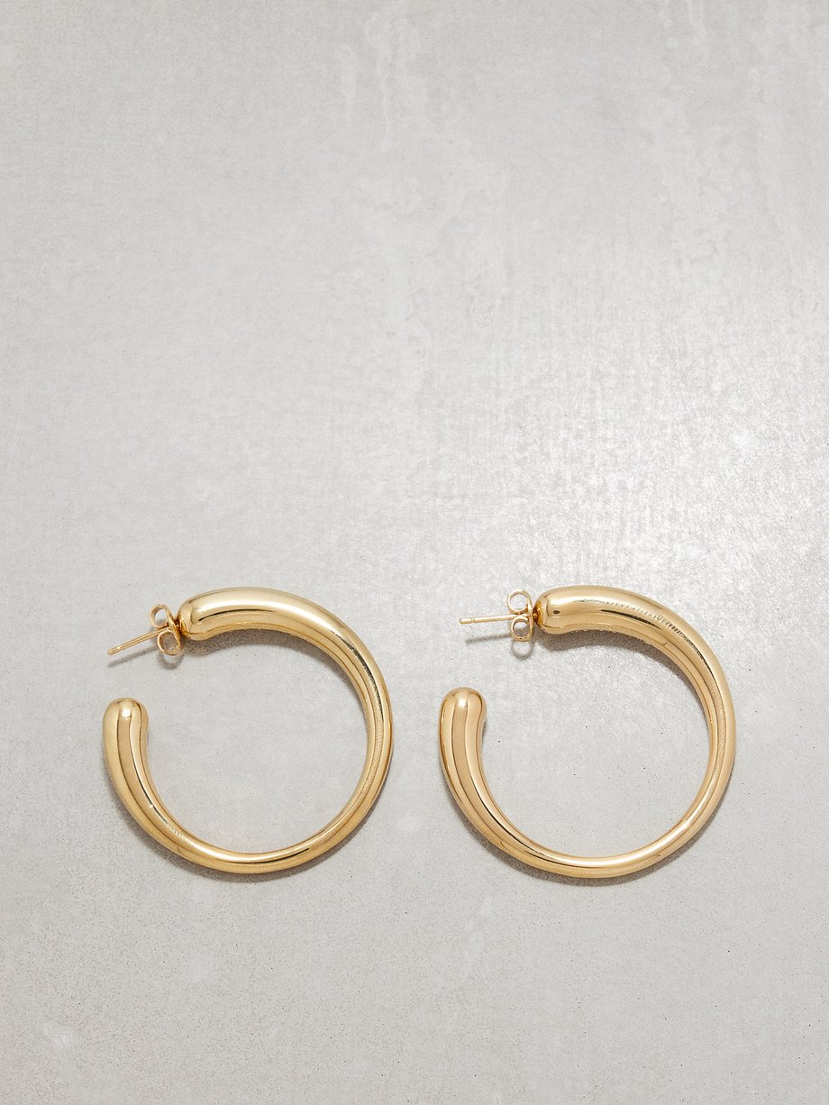 Gold Organic hoop earrings | Saint Laurent | MATCHES UK