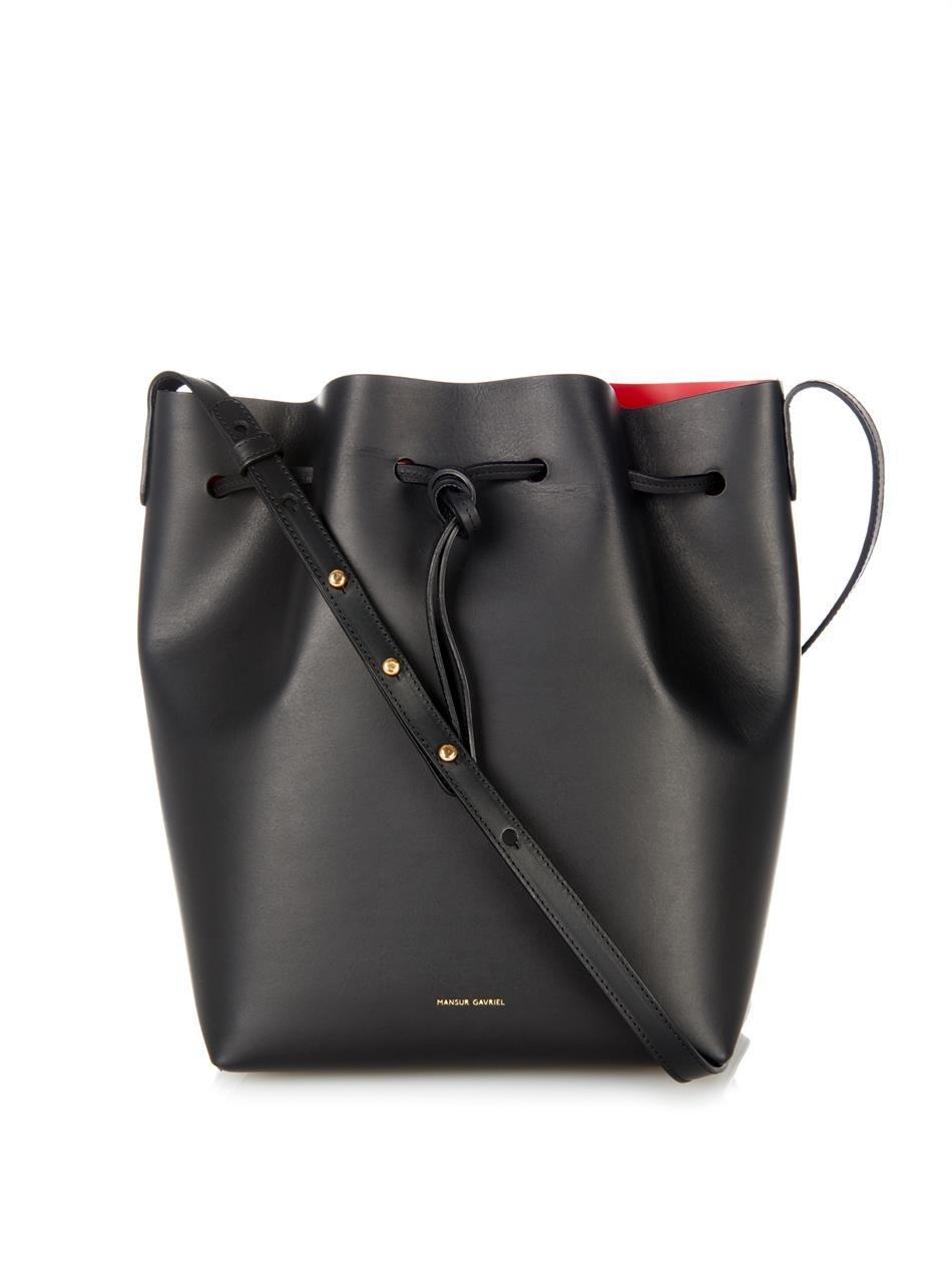 black bucket bag with red lining