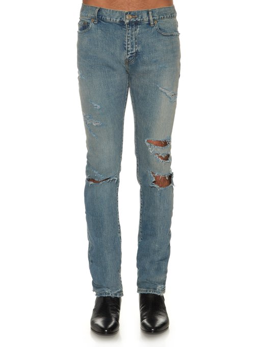 Slim-fit distressed jeans | Saint Laurent | MATCHESFASHION UK
