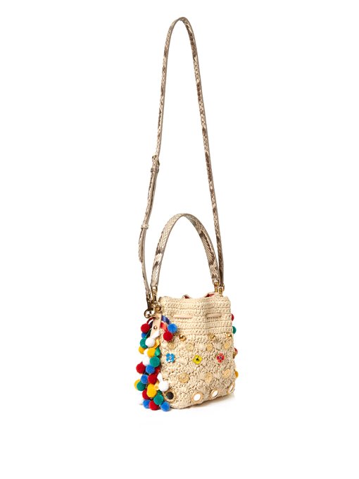 Claudia pompom-embellished raffia bag | Dolce & Gabbana | MATCHESFASHION US