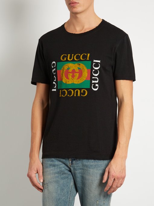 Distressed logo-print cotton T-shirt | Gucci | MATCHESFASHION US