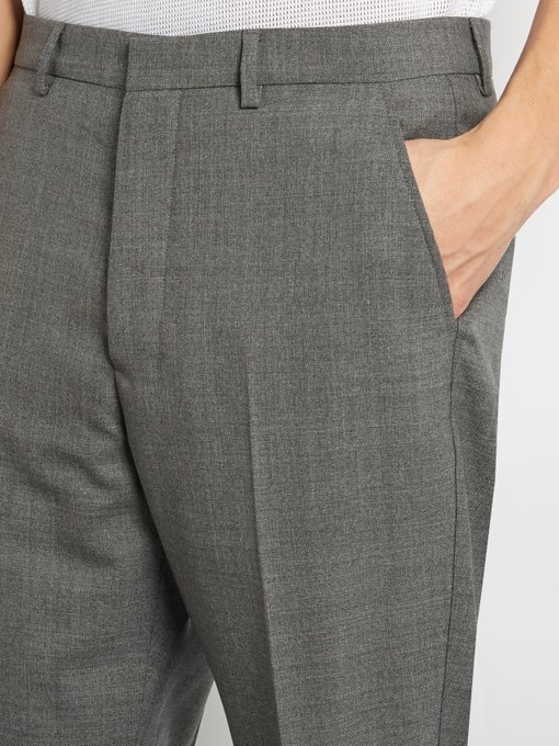 Carrot-fit wool trousers | AMI | MATCHESFASHION UK