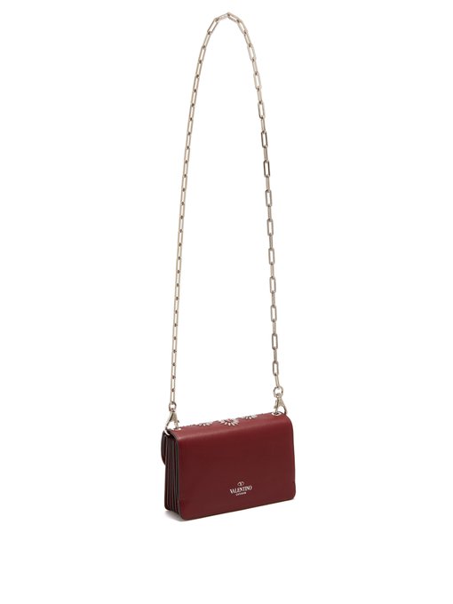 valentino garavani stud embellished leather shoulder bag